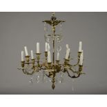 A FRENCH GILT BRONZE CHANDELIER with twelve foliate cast branches,