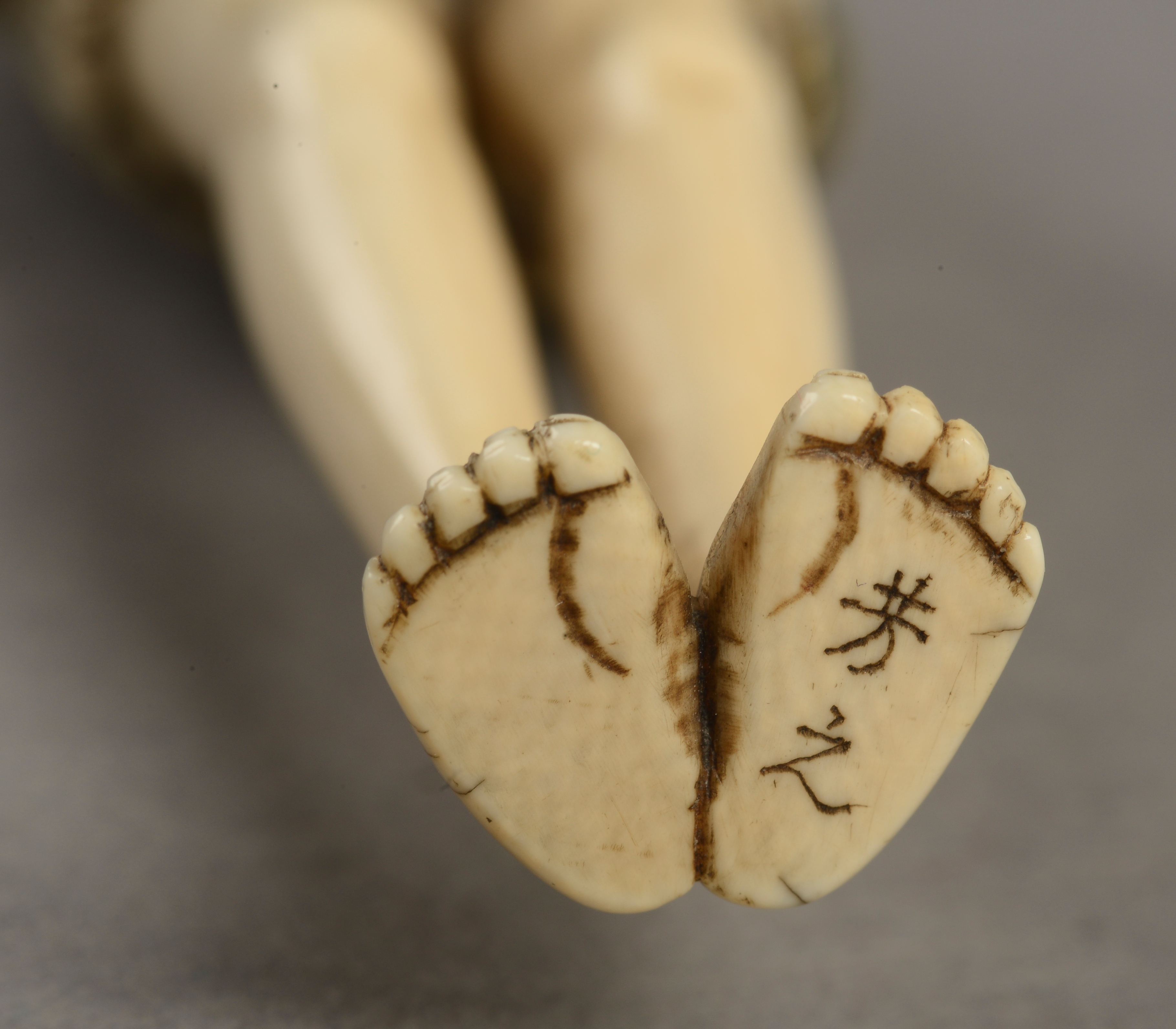 A JAPANESE IVORY NETSUKE, signed Yoshiyuki, Meiji period, - Image 2 of 2