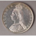 AN 1887 SILVER FOUR SHILLING PIECE