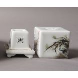 A SMALL CHINESE PORCELAIN SQUARE FORM CENSER AND COVER decorated in famille rose enamels with