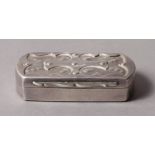 AN EDWARD VII ARTS AND CRAFTS SILVER SNUFF BOX of rectangular outline with rounded ends and cutwork