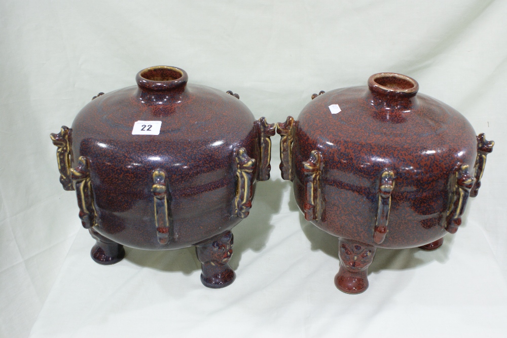 A Pair Of Large Oriental Pottery Tripod Vases With Mottled Glaze