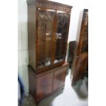 A Reproduction Mahogany Finish Two Piece Bookcase Cupboard