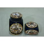 Two Carlton Ware Blue Ground And Floral Decorated Lidded Pots