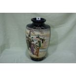 An Early 20th Century Satsuma Pottery Vase With Panels Of Figures