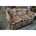 An Edwardian Floral Upholstered Two Seater Settee
