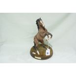 A Matt Glazed Model Of A Rearing Horse Titled "Spirit Of The Wild"