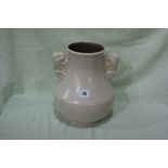 A Cream Glazed Two Handled Poole Pottery Vase