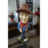 A Plaster Work Caricature Model Of John Wayne