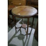 An Edwardian Mahogany Two Tier Occasional Table