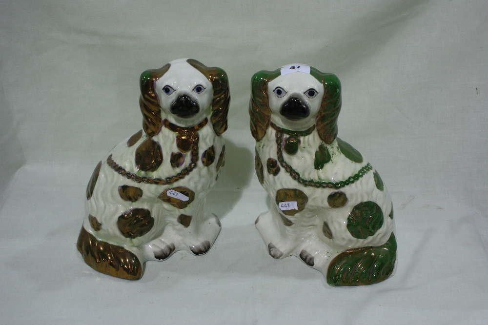 Two Lustre Glazed Staffordshire Pottery Seated Dogs