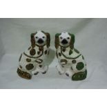Two Lustre Glazed Staffordshire Pottery Seated Dogs