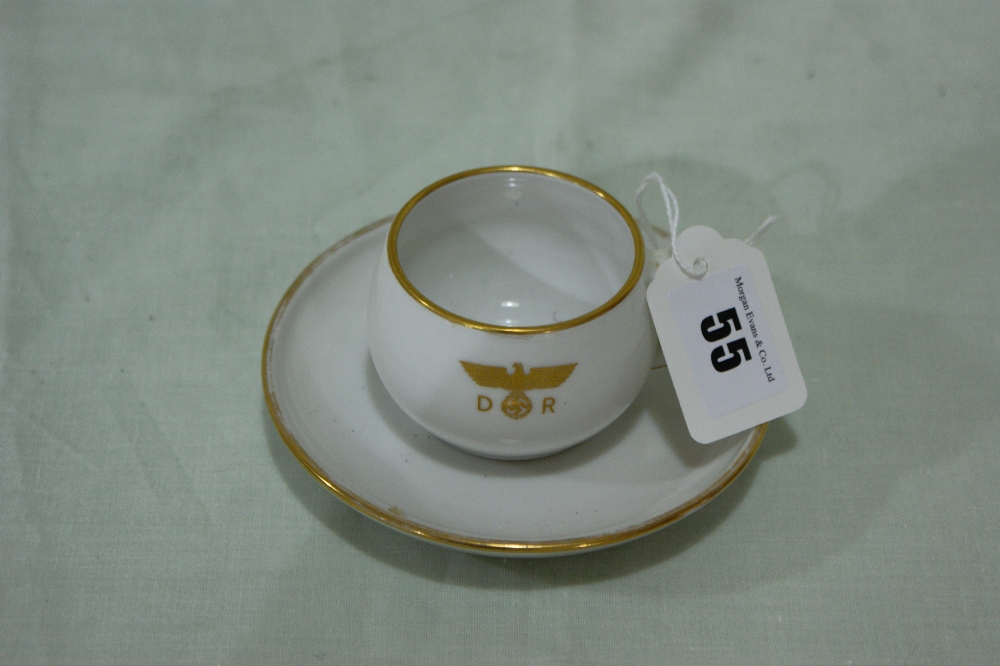 A Porcelain Third Reich Related Cup And Saucer With Gilt Emblem (As Used On The German State