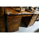 A Reproduction Walnut Finish Knee Hole Desk