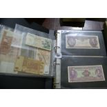 A Collection Of World Bank Notes And Coins