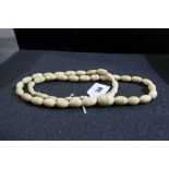An Antique Ivory Bead Necklace