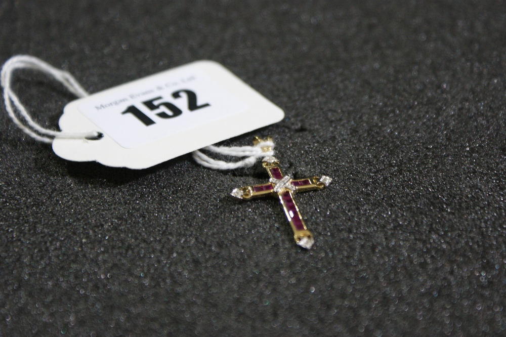 A Nine Carat Gold Ruby And Diamond Set Crucifix Pendant
