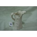 A Royal Worcester White Glazed Leaf Jug