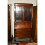 An Early 20th Century Oak Bureau Bookcase