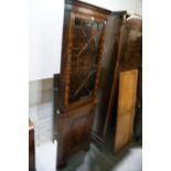 A Reproduction Mahogany Finish Standing Corner Cupboard