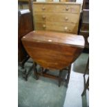 An Early 20th Century Polished Drop Leaf Table