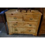 A Stripped Pine Chest Of Two Short And Two Long Drawers