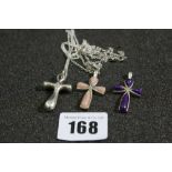 Three Crucifix Pendants And Chains