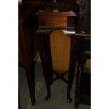 An Edwardian Mahogany Jardiniere Stand On Four Supports