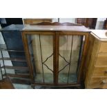 An Early 20th Century Walnut Veneered Two Door China Cabinet