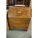 An Edwardian Mahogany And Satinwood Cross-Banded Four Drawer Bureau