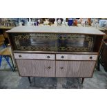 A 1960s Laminate Finish And Glazed Dining Room Sideboard