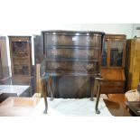 A Reproduction Walnut Veneered Three Drawer Bedside Chest