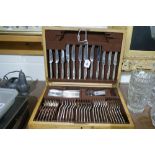 A 20th Century Oak Canteen Of Cutlery