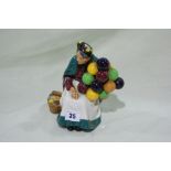 A Royal Doulton China Figure "The Old Balloon Seller" HN1315