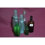 A Parcel Of Vintage Coloured Glass Bottles