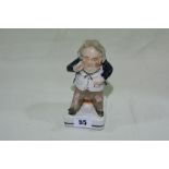 A 19th Century Staffordshire Tavern Figure Of A Seated Snuff Taker, Blue Lined Base
