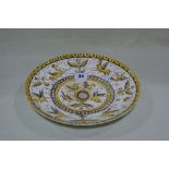 A Circular Minton Pottery Dished Plate Decorated With Mythological Creatures, Signed M C Partridge