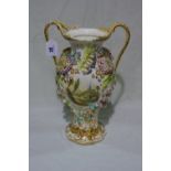 A 19th Century Porcelain Floral Encrusted Two Handled Vase With Painted Landscape Scenes, Possibly