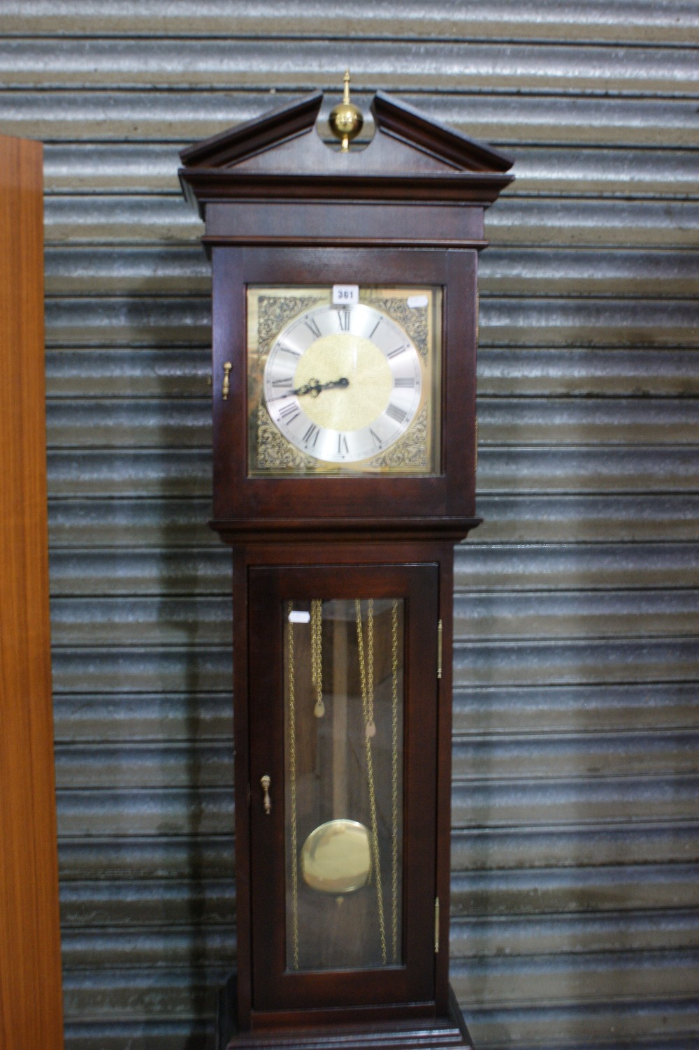 A Mahogany Finish Reproduction Pendulum Grandfather Clock