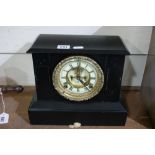 A Victorian Slate Encased Mantle Clock With Circular Dial