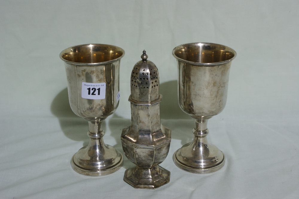 A Pair Of Circular Based Plated Goblets Together With A Sugar Shaker