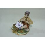 A 20th Century Capo De Monte Figure Of Seated Hiker