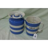 A Cornish Ware Blue Banded Milk Jug Together With A Similar Storage Jar