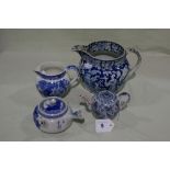 Two Blue And White Transfer Decorated Milk Jugs Together With Two Similar Oriental Teapots