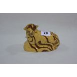 A Staffordshire Pottery Slip Ware Decorated Mould In The Form Of A Seated Lamb