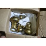 A Set Of Five Brass Bell Weights