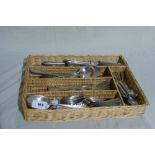 A Basket Of Mixed Loose Cutlery