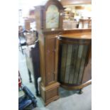 An Early 20th Century Oak Encased Grandmother Clock