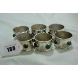 A Set Of Six Green Stone Set Silver Plated Serviette Rings