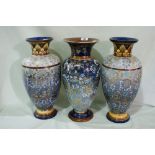 A Pair Of Royal Doulton Stoneware Vases With Stylised Floral Scratch Decoration Together With A